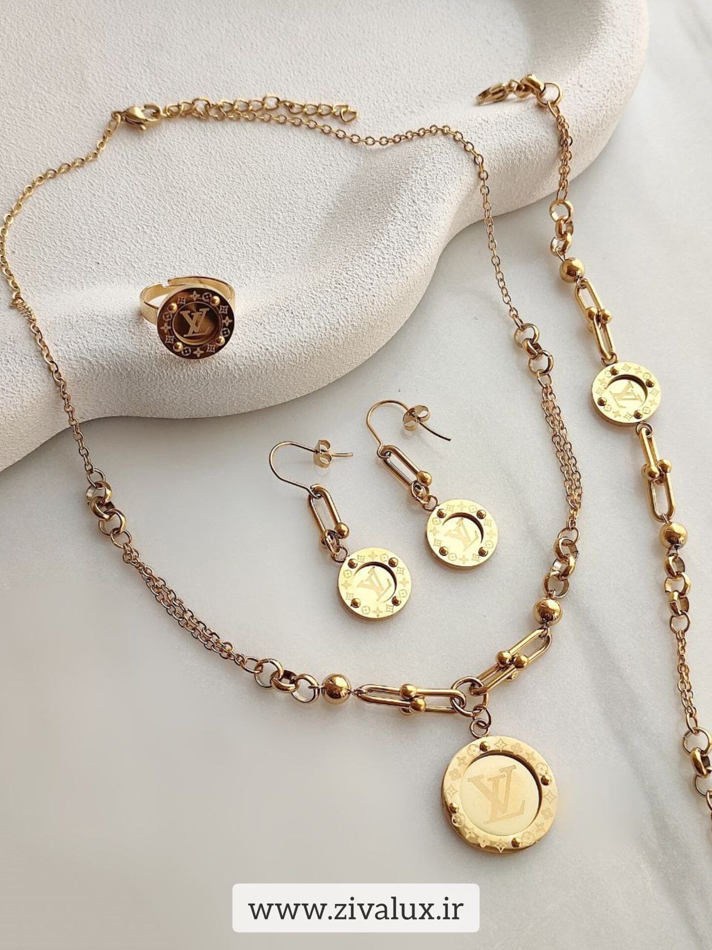 سرویس زنانه استیل مارک لویی ویتون LV (دستبند+گردنبند+گوشواره+انگشتر)   (Louis Vuitton)