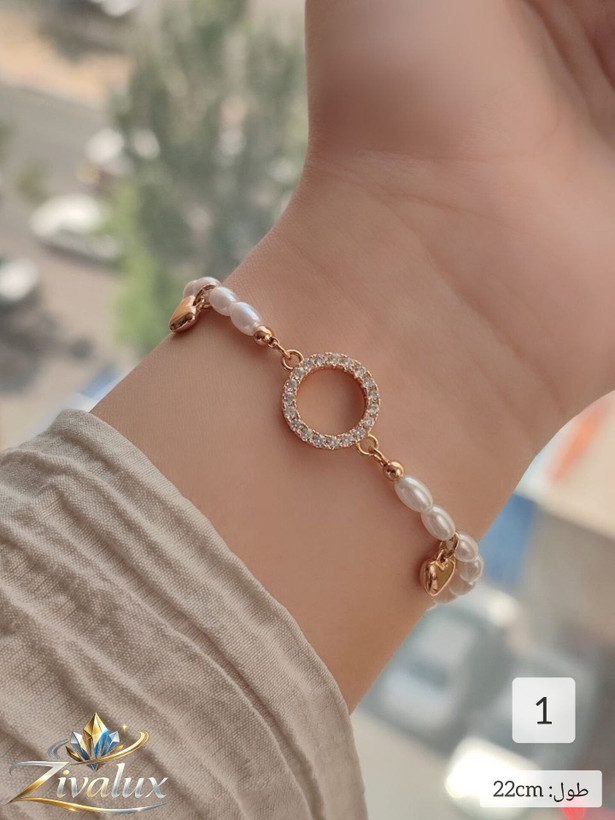 دستبند زنانه مارک ژوپینگ XUPING طرح مرواریدی آویز قلب